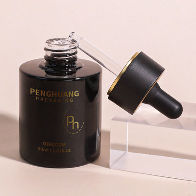 Круглая стеклянная бутылка капельницы с настраиваемым логотипом в соответствии с требованиями клиента