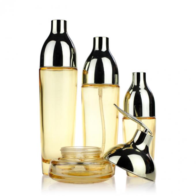 Роскошные стеклянные бутылки лосьона установили подгонянные стеклянные опарникы сливк представляют косметический упаковывая набор контейнера