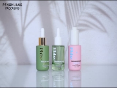 Напечатанная стеклянная причудливая капельница сыворотки 1oz разливает по бутылкам для косметической упаковки