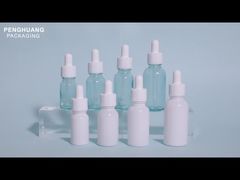 Стеклянная бутылка с капельницей масла